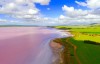Insane drone photos of pink lakes, erupting volcanoes, and more