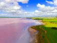 Insane drone photos of pink lakes, erupting volcanoes, and more