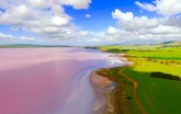 Insane drone photos of pink lakes, erupting volcanoes, and more